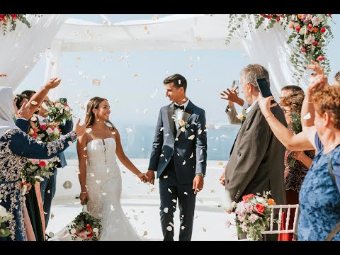 Colourful wedding in Santorini. Alaa & Bill on their big day!!