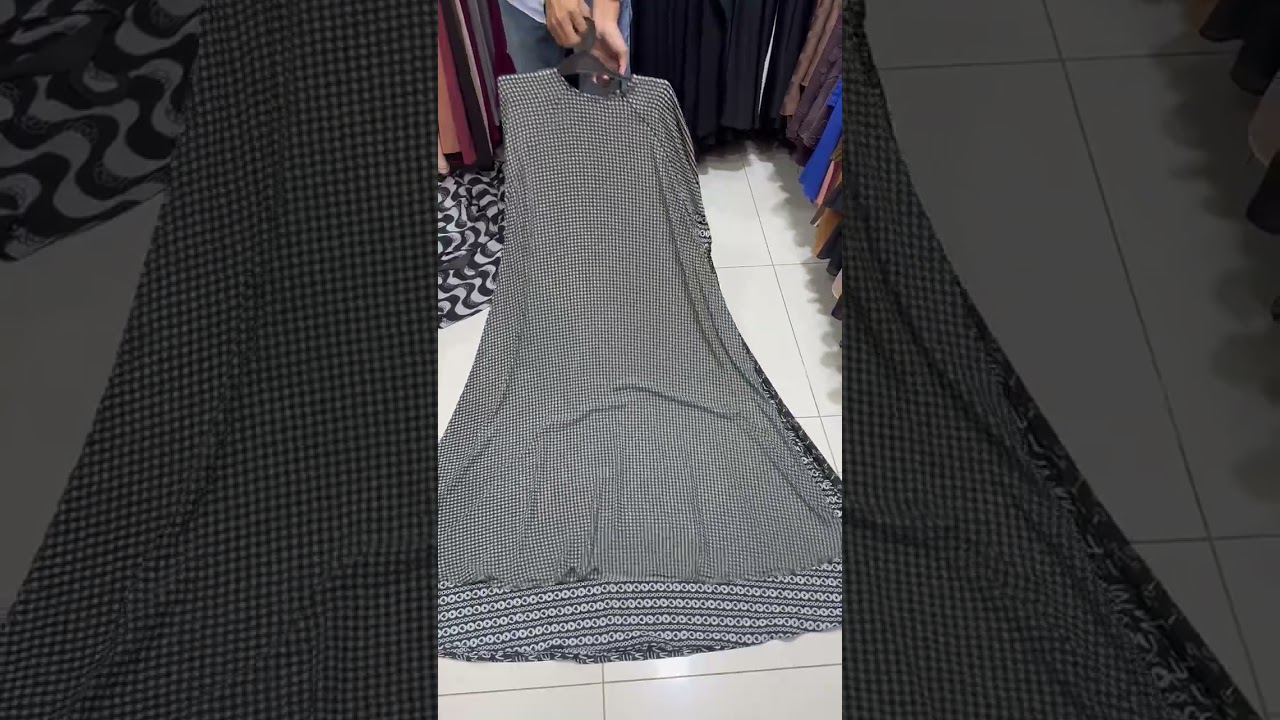 Step into elegance with our latest Printed Abaya Collection