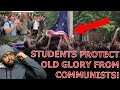 Unc chapel hill students sing national anthem while protecting american flag from woke protestors