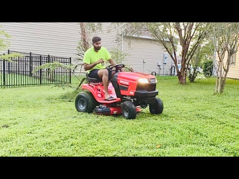 Craftsman T100 riding lawn mower in action - YouTube