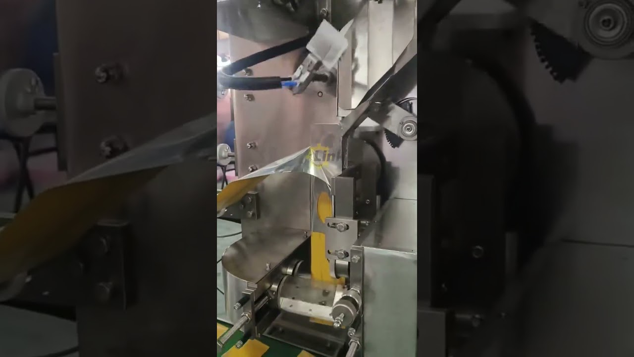 The tea packaging machine with inner and outer bags and labels is suitable for automatic