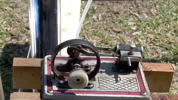 Trash can lid powers a steam engine parabolic mirror