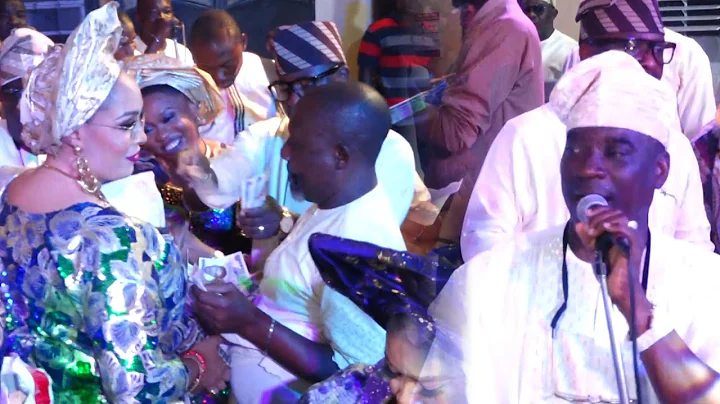 MONEY RAIN AS EMMANUELLA  K1 DE ULTIMATE WIFE SHOWOFF HER DANCE MOVES AS HE SINGS FOR HER ON STAGE