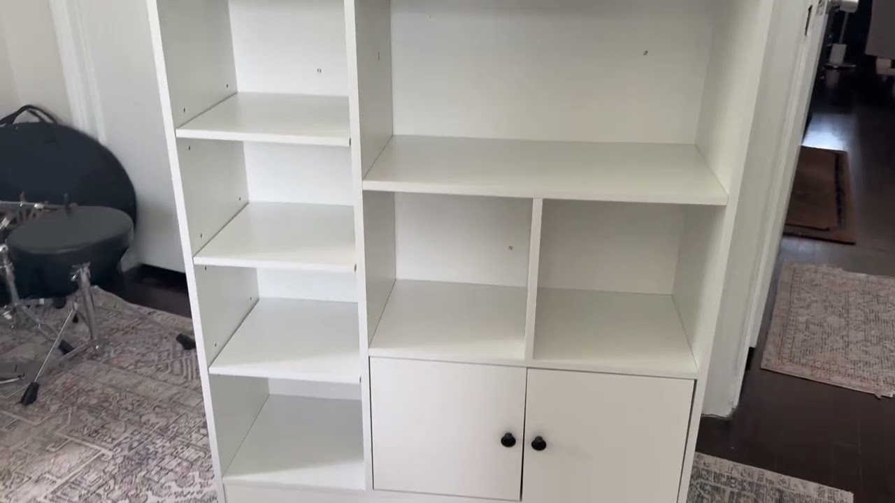 Обзор детской книжной полки DIYART белого цвета, стеллажа с 7 отделениями и 2 шкафчиками.