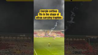 "EPIC TIFO! 🔥 Energie Cottbus Ultras Lift the DFB Pokal Trophy in Stunning Display!"