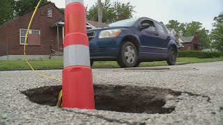 Residents fighting for action on sinkhole in middle of street