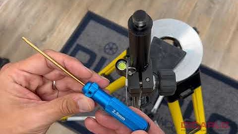 Prism pole level vial adjustment