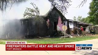 Firefighters battle extreme heat and heavy smoke at Ft. Branch fire
