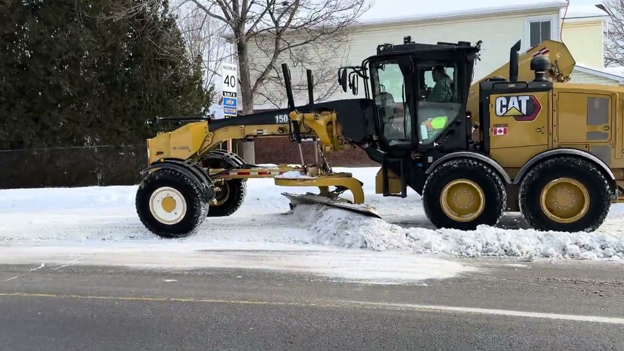 Snow bank removal on Gardenway in the falling brook area 