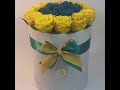 Yellow and Blue preserved roses arrangement