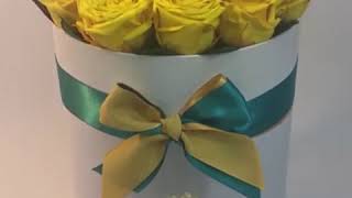 Yellow and Blue preserved roses arrangement