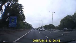2015-06-13 White Crossover Tailgates and Nearly Collides Entering Motorway