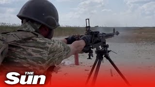 Ukrainian border guards fire huge heavy guns in shooting training