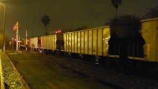 Only in Florida: Three CSX SD70ACe-T4's lead O713 to Orlando through the rain.