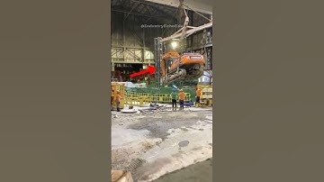 Excavator falls into a 400-foot pit #shorts