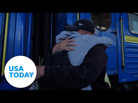 Ukrainian couples, families reunite at Kharkiv train station | USA TODAY