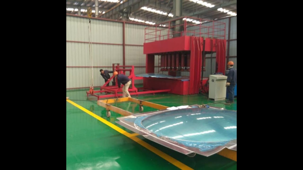 Hydraulic dished head configuring machine