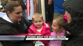 Rain Dampens Music Fest, But Not Spirits