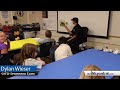 Grand Island Fire Fighters read to Shoemaker Elementary kids