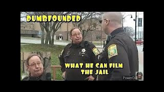 YOU ARE LOITERING IN FRONT OF JAIL id refusal i dont answer questions first amendment audit