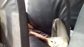 Kid falls into crack of bus seat