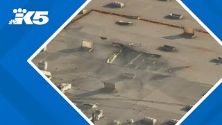 At least one dead, a dozen injured after plane crashes into southern California warehouse