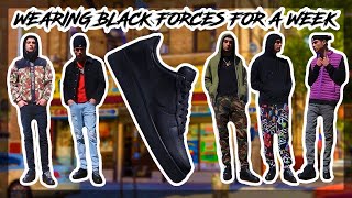 wearing black air force ones