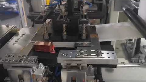 How a stacking machine picking cathode and another chips during the lithium ion battery production