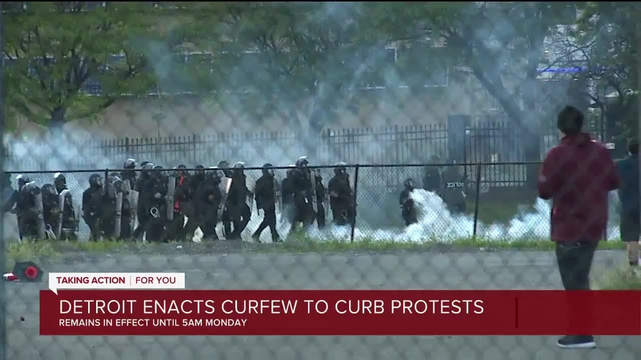 Large crowd defies curfew in downtown Detroit, police fire tear gas in