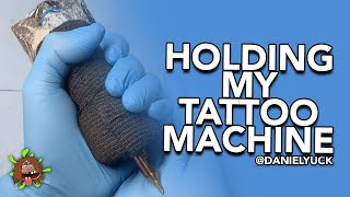 Holding A Tattoo Machine