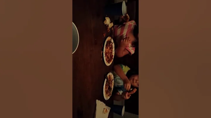 My kids eating spaghetti.