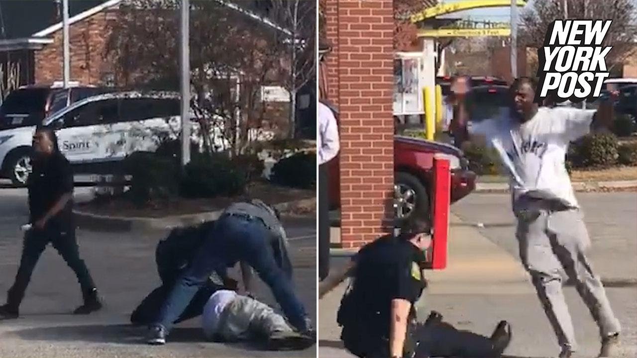 Onlookers help cop arrest violent suspect | New York Post