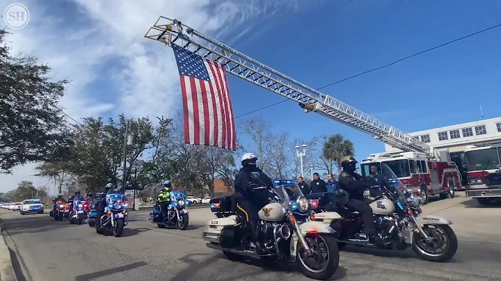 Watch law enforcement procession escort slain Hanc...