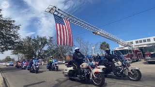 Watch law enforcement procession escort slain Hancock deputy's body back to MS