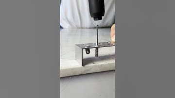 Comparison of the riveting effect of grooved rivets and drum spigots show