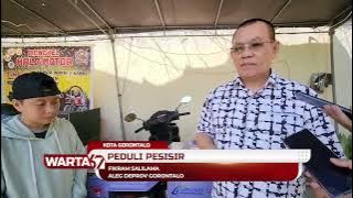 FIKRAM SALILAMA DISTRIBUTES COOLBOX MOTORCYCLES AND OUTBOARD ENGINES TO FISHERMEN IN GORONTALO CITY