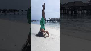Headstand Practice On The Beach Maldives