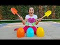Finding surprise eggs in sandbox, funny kid video