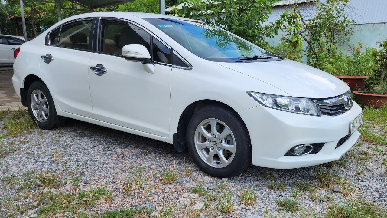 Honda Civic 2012 1.8AT màu trắng 5 chổ lh 0989209864 xe đẹp Bình Dương