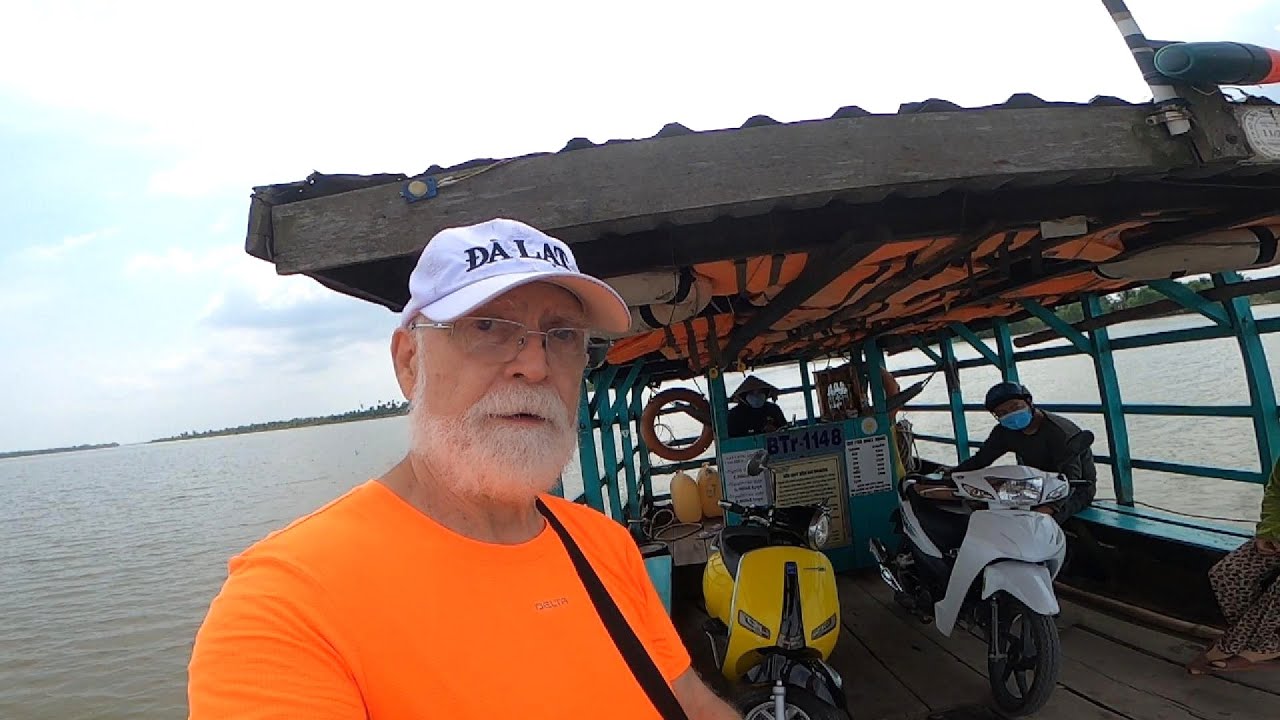ALL ABOARD!  Its finally time to return.  Small ferry ride.  Ben Tre to Tien Giang, Vietnam.