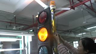 portable traffic light with piezoelectric buzzer function