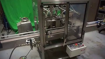 Six Head Straight Line Piston Filling Machine - Used