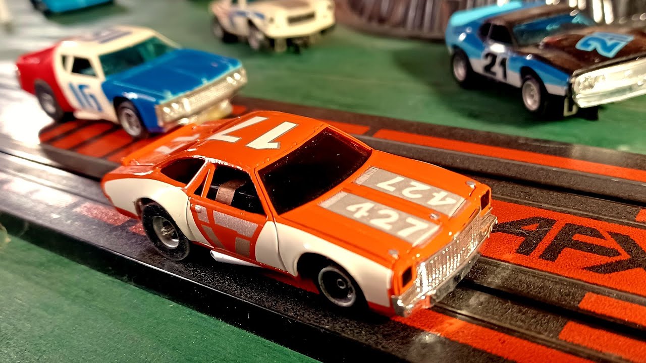 Auto World XTraction vs AFX MagnaTraction HO Slot Cars Race YouTube