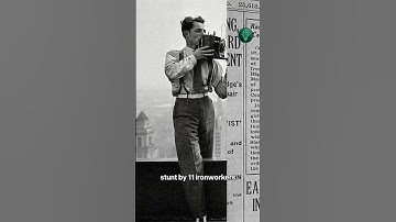 Lunch bovenop een wolkenkrabber Foto uitgelegd