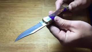 Purple and Osage Custom Buck 110