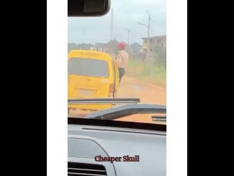 FRSC Officer Hanging On A Yellow Bus In Enugu State - Conductor Work