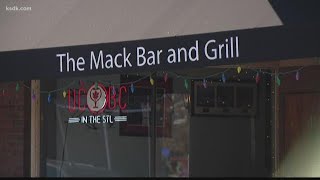 Masked gunmen rob more than a dozen at bar
