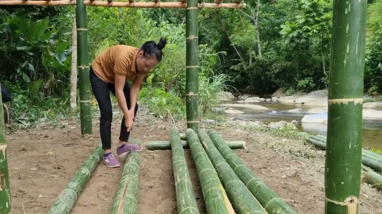Build a house on the river bank using bamboo
