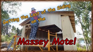 Getting the Last of the Siding on the Massey Motel