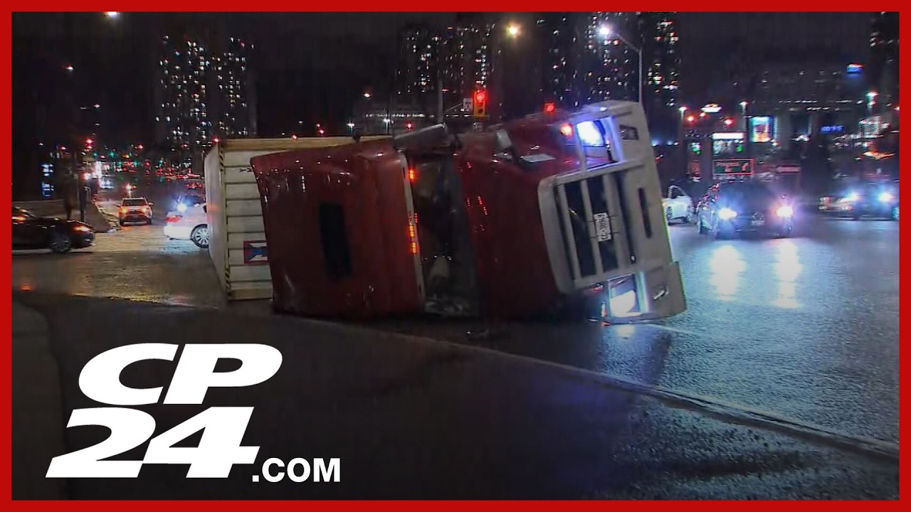 Tractor trailer flips over in Scarborough - YouTube
